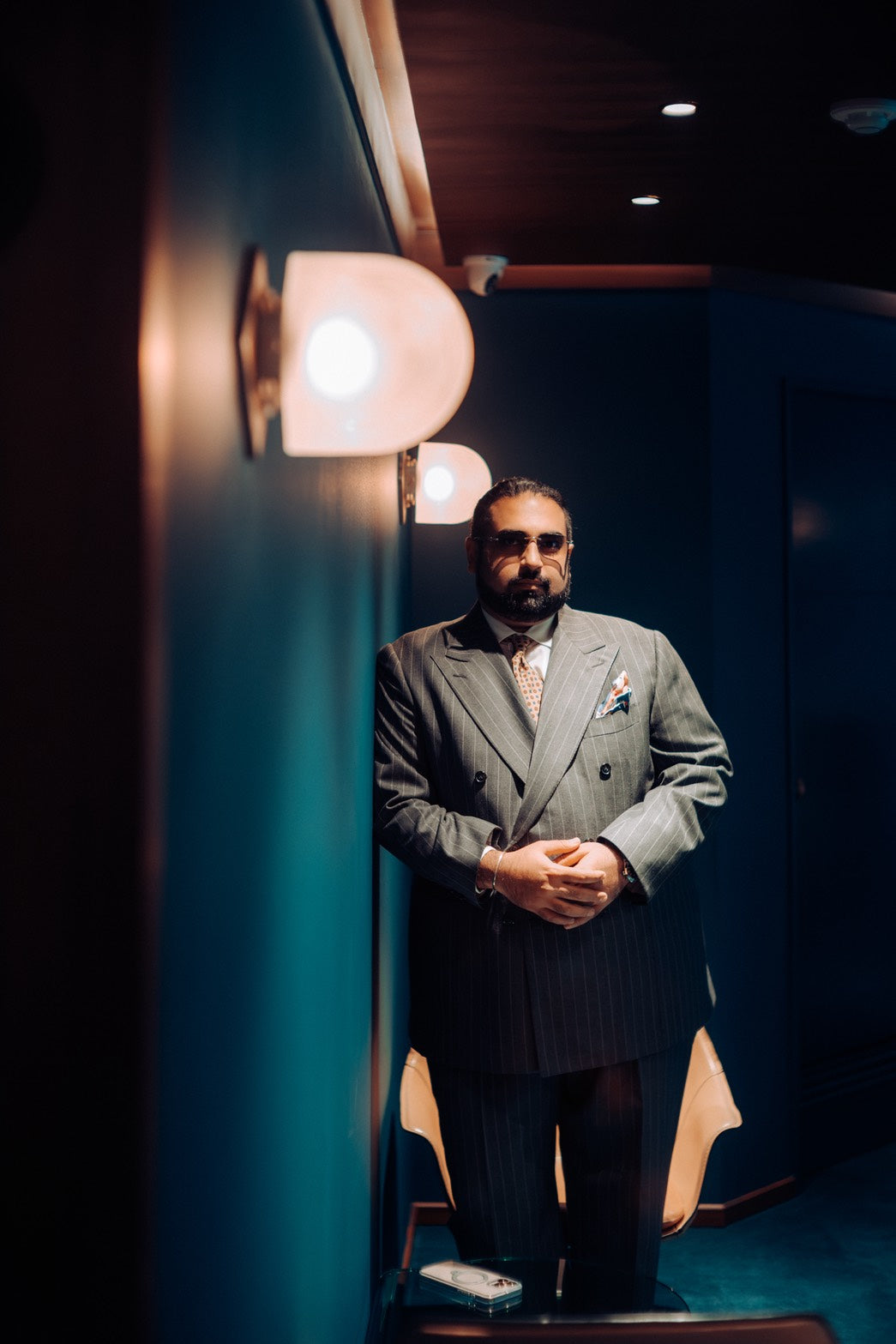 Cigar session in Sarto Kang’s Commissioned suit. Sprezza Boutique